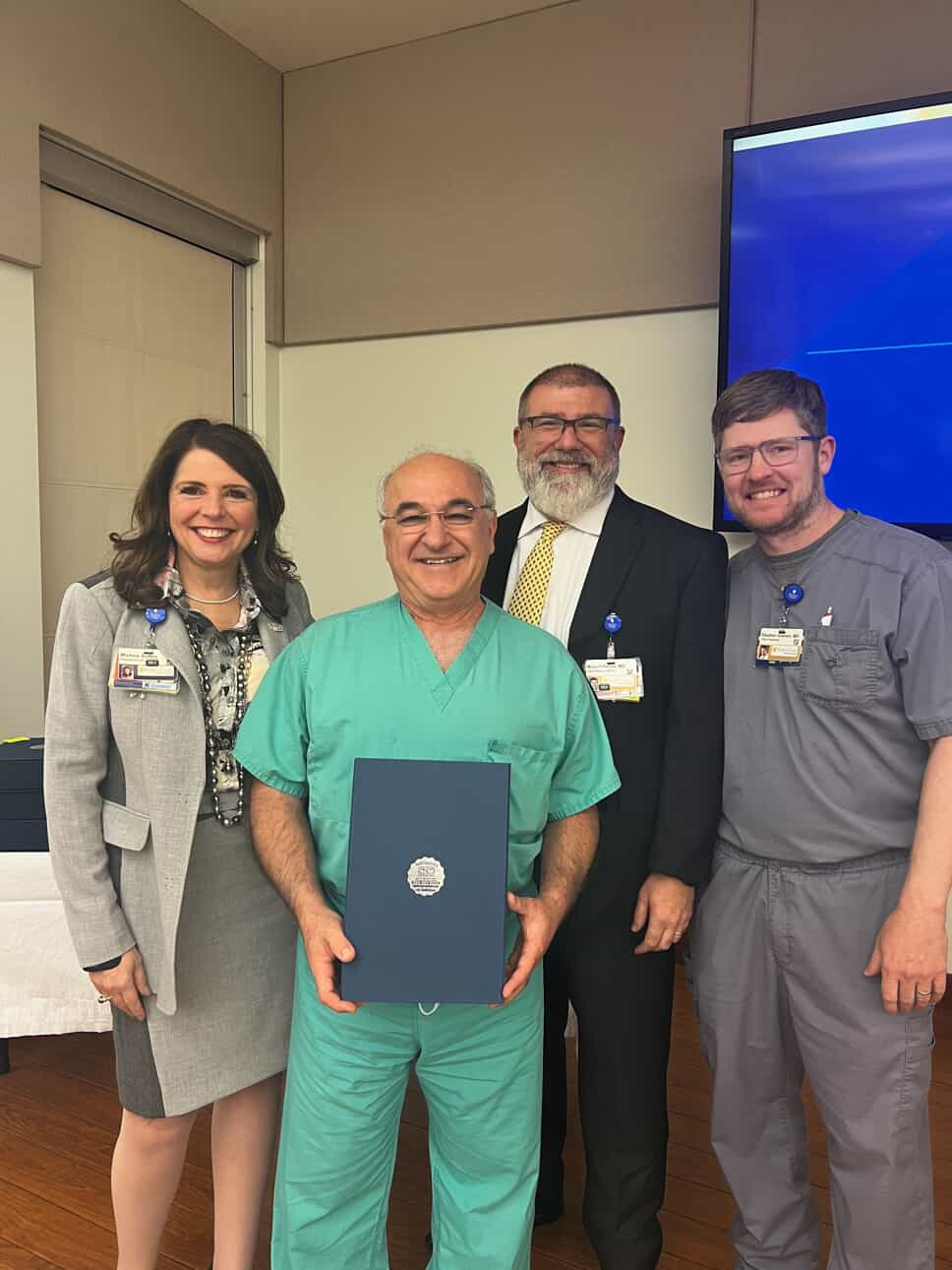 From left are President/CEO Michele Sutton, FACHE; 2023 Physician of the Year Jose Mena, MD, FACS; Chief Medical Officer Robert Peltier, MD; and Stephen Graham, MD, who was named Physician of the Year in 2022.